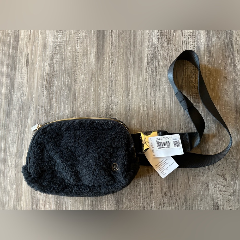 lululemon athletica Black Fleece Crossbody Bag with Gold Accents